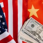 american and chinese flags and usa dollars